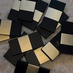 Elegant packaging of sheer nylon tights with product label and care instructions, minimal aesthetic design for online retail display.