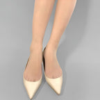 Detailed view of seamless waistband and reinforced toe design, crafted for durability, comfort, and smooth leg contour.