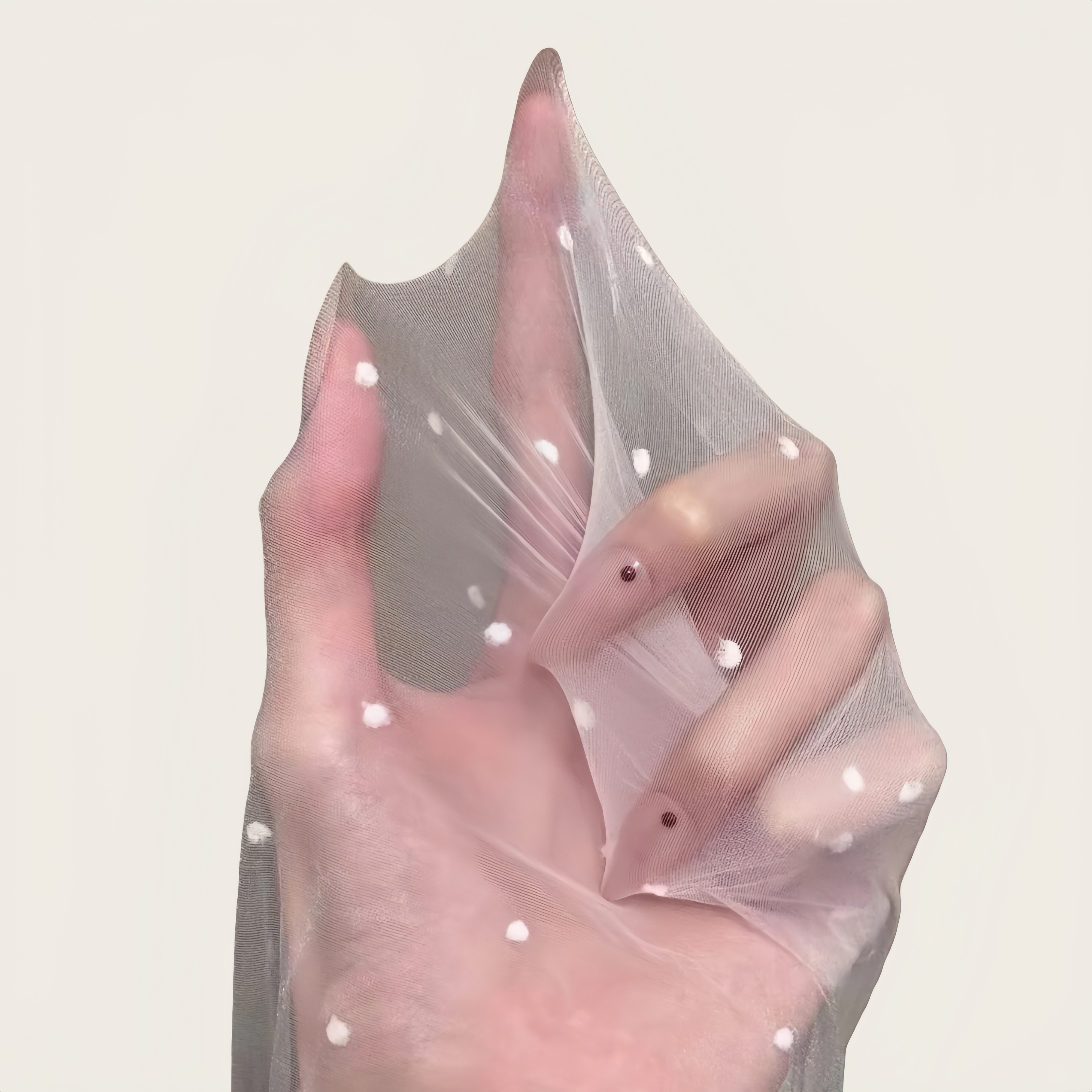 Close-up of fine nylon spandex fabric with high-density weave, soft and durable sheer tights material showing smooth and breathable texture.