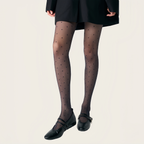 Elegant woman wearing ultra-sheer nylon tights with smooth texture and natural matte finish, lightweight pantyhose for everyday comfort and refined style.